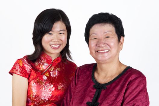 Portrait of happy Asian Chinese Mother and Daughter.
