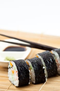 close up Sushi Roll with soy sauce.