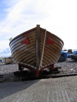 Bow of Wooden Motor Boat on a Beach in Devon