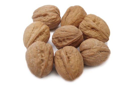 Walnuts on white background. Close up image