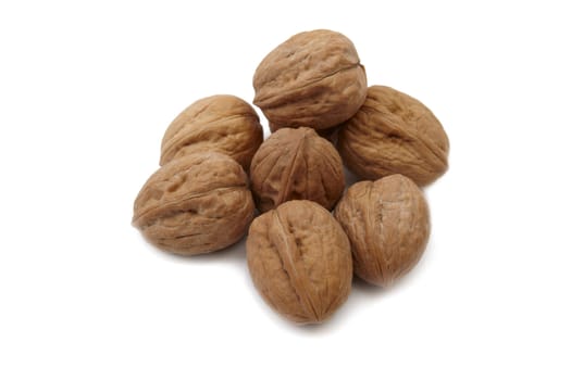 Walnuts on white background. Close up image