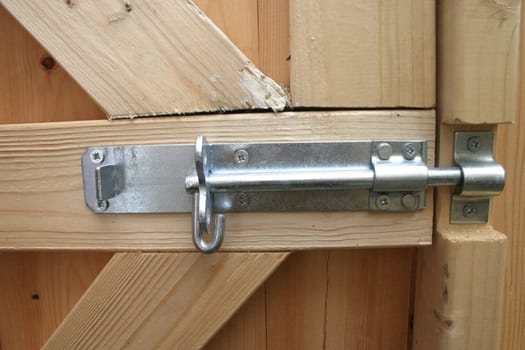 Strong Steel Bolt on Wooden Gate