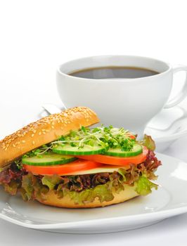 Delicious and healthy bagel sandwich with coffee.