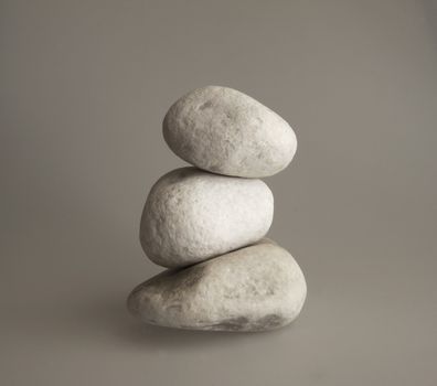 Three pebbles in a pile