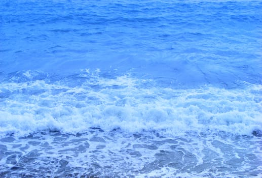 Blue Waves of sea coming to the beach