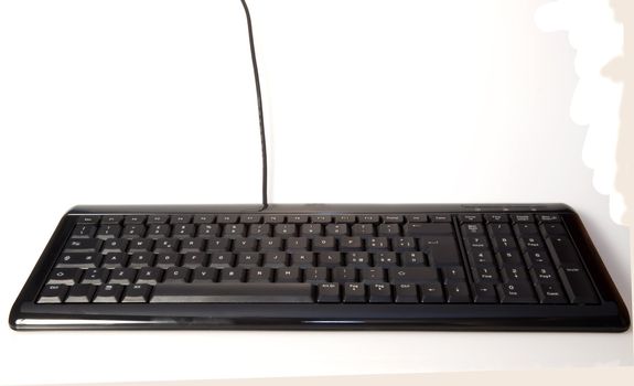 Black keyboard for computer, over white background