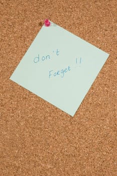memo board with message: dont forget
