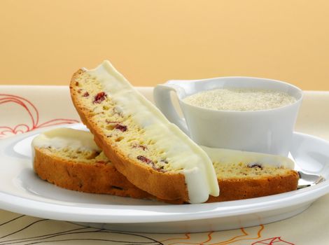 Delicious cranberry and white chocolate biscotti with coffee.