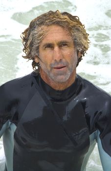 Middle Aged Surfer in the Water