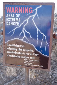 Lightning warning sign on a top of Morro Rock in Sequoia National Park
