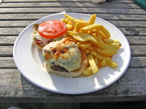 Posh Burger and Chips Outside an English Pub