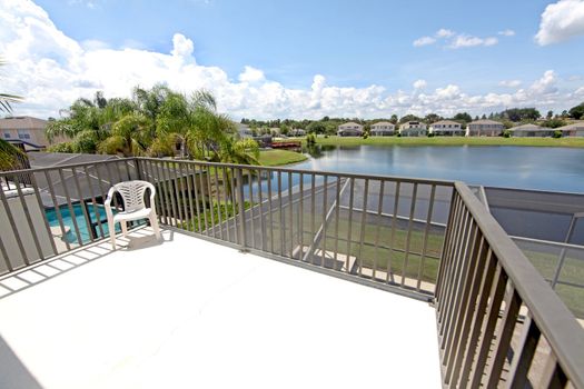 A Balcony overlooking a lake in Florida
