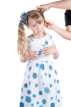 Shot of little girl with ponytails in studio