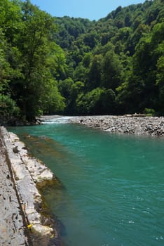 mountain river Sochi falling into Black sea