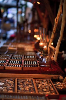 accessory selling at a market in evening