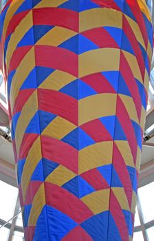 Closeup of Large Code Shaped Red Yellow and Blue Decoration