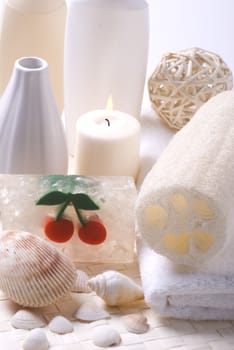 Various items for bath soap sponge towel and candle 
