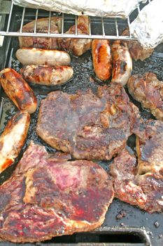 Sizzling Meat on Summer Barbecue