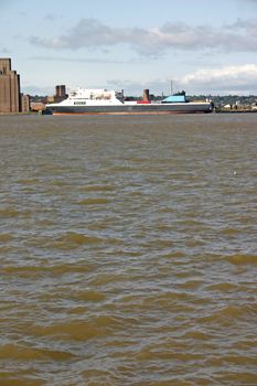 Cargo Ferry Ship on the River Mersey in Liverpool England UK