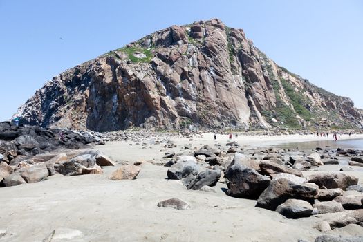Morro Rock is a 581-foot (177 m) volcanic plug located just offshore from Morro Bay, California