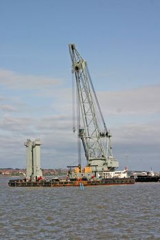 Massive Water Crane Barge on River Mersey in Liverpool England UK