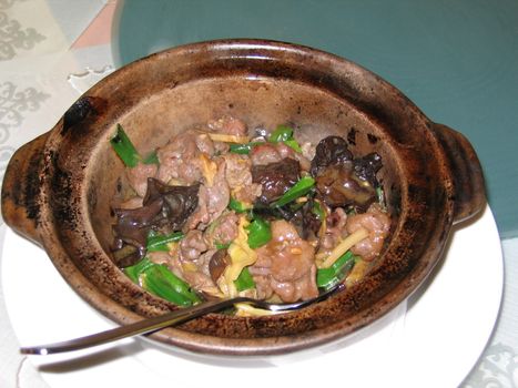 Chinese Pork and Mushroom Stew in Hot Pot