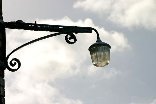 Silhouette of Old Street Light on the Liverpool Promenade UK