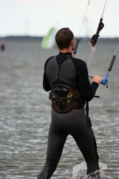 a kite surfer at the beach