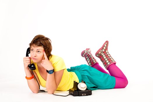 people series: young girl in bright clothes speak on phone