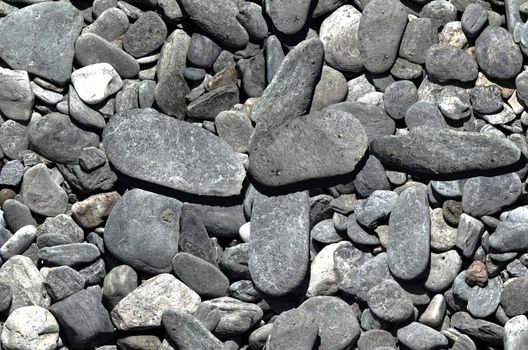 Vertically and horizontally tiling image of pebbles.  Use for high-definition backgrounds