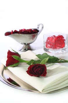 Two roses on a tray