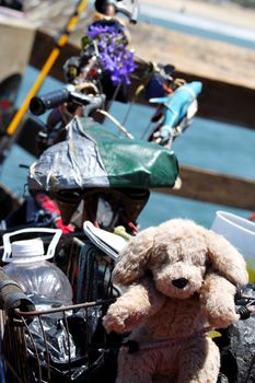 Bike from a homeless person with different stuff on it.