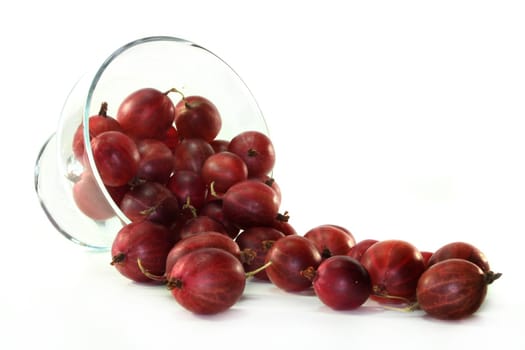 a handful of gooseberries on a white background