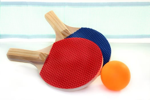 two table tennis bats, net and ball on a white background