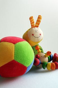 babys toys colorful ball and smiling worm