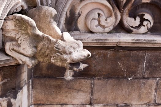 stone statue on the cupola of Milan's cathedral
