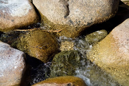 big stones in the stream 
