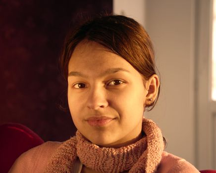 pretty smiling caucasian teen girl portrait indoor