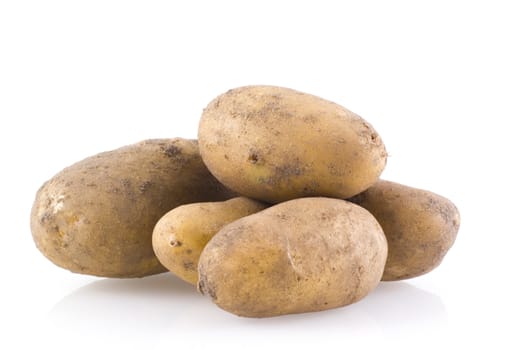 Few potatoes isolated on a white background.