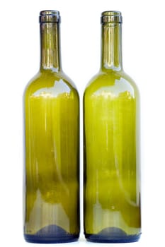 Two empty bottles of green glass for wine on white background