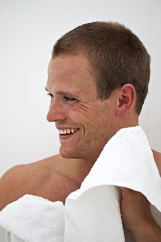 young man with a towel