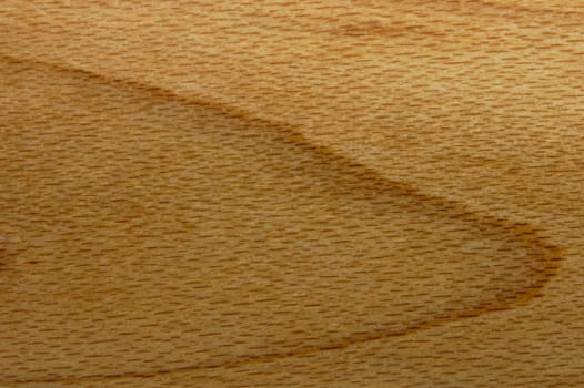 Close-up of the grain in a piece of beech wood, suitable for background.