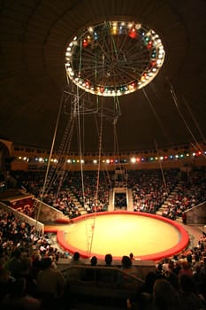 Brightly shined empty arena in modern circus