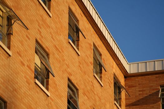 Brick building with open windows