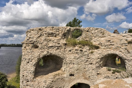 Ruins of ancient tower near river