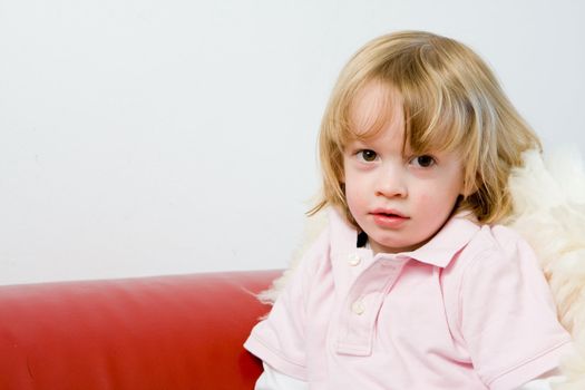 Adorable cute young european caucasian child posing and smiling 