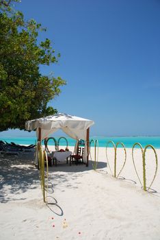 beautiful wedding tent on a tropical beach in Maldives