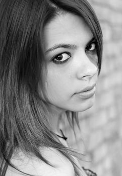 Portrait of beautiful young woman, black-white