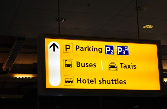 Amsterdam Schiphol terminal sign: bus, taxi and parking