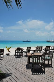 beautiful photo of a tropical view at a beach bar in a maldivian island